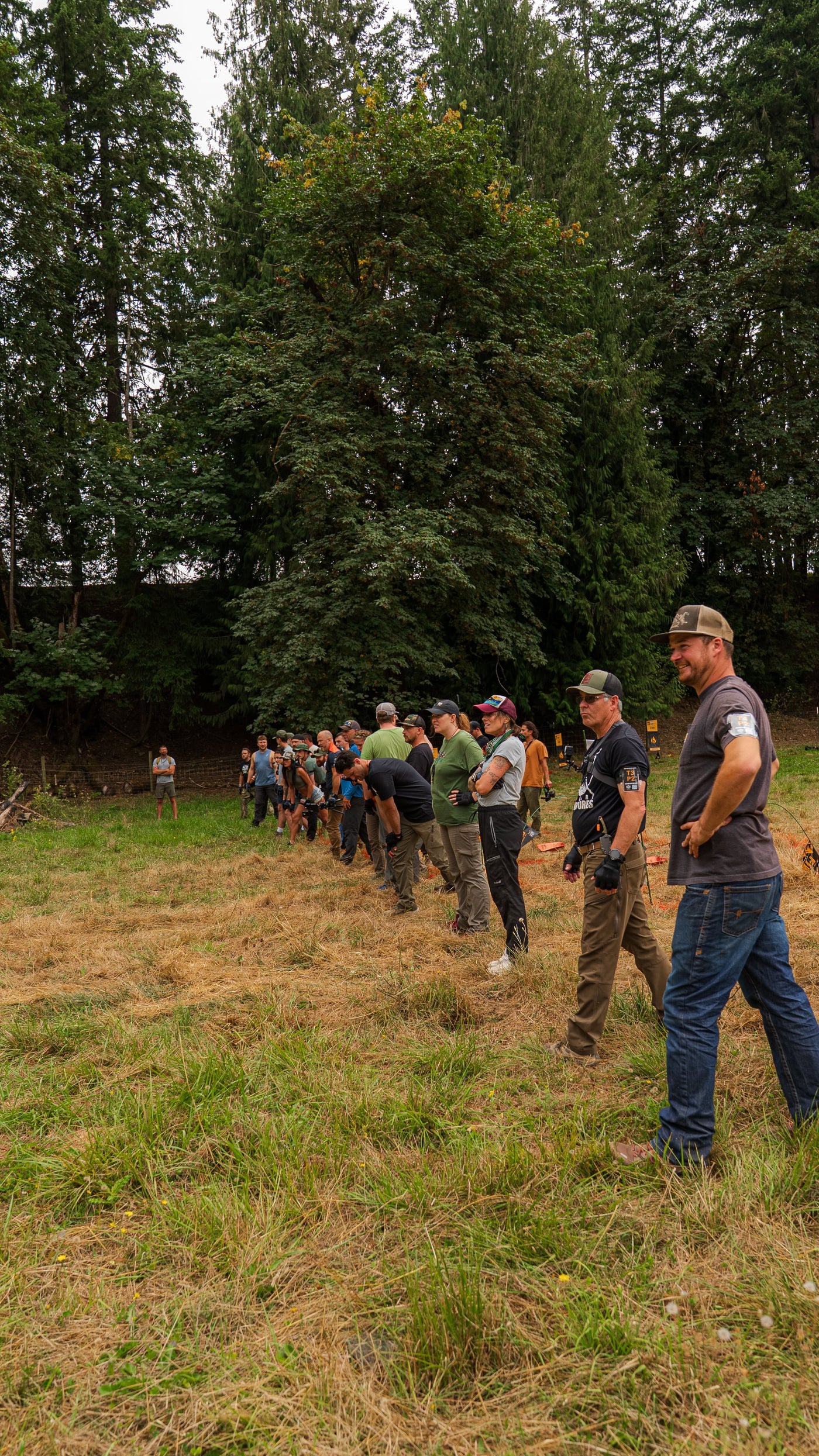 Competitors lined up in a forest clearing at the 2026 PNW Survival Games